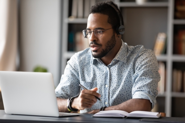 focused man at computer